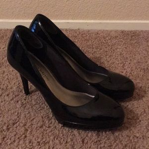 Classic black patent platform pumps